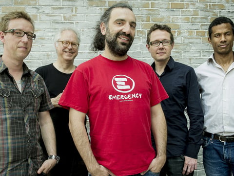 Stefano Bollani (center) and the musicians who back him on the new album Joy in Spite of Everything. From left: Mark Turner, Bill Frisell, Jesper Bodilsen, Morten Lund.

